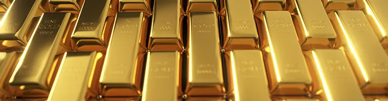 Precious metals investment guide showing gold bars and coins for IRA
